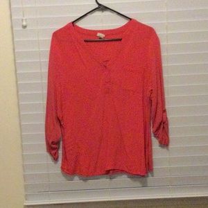 Hot pink three-quarter length Henley.